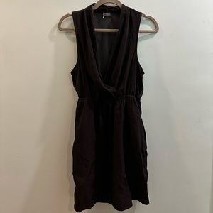 Super cute dress with a see-through back and POCKETS!
